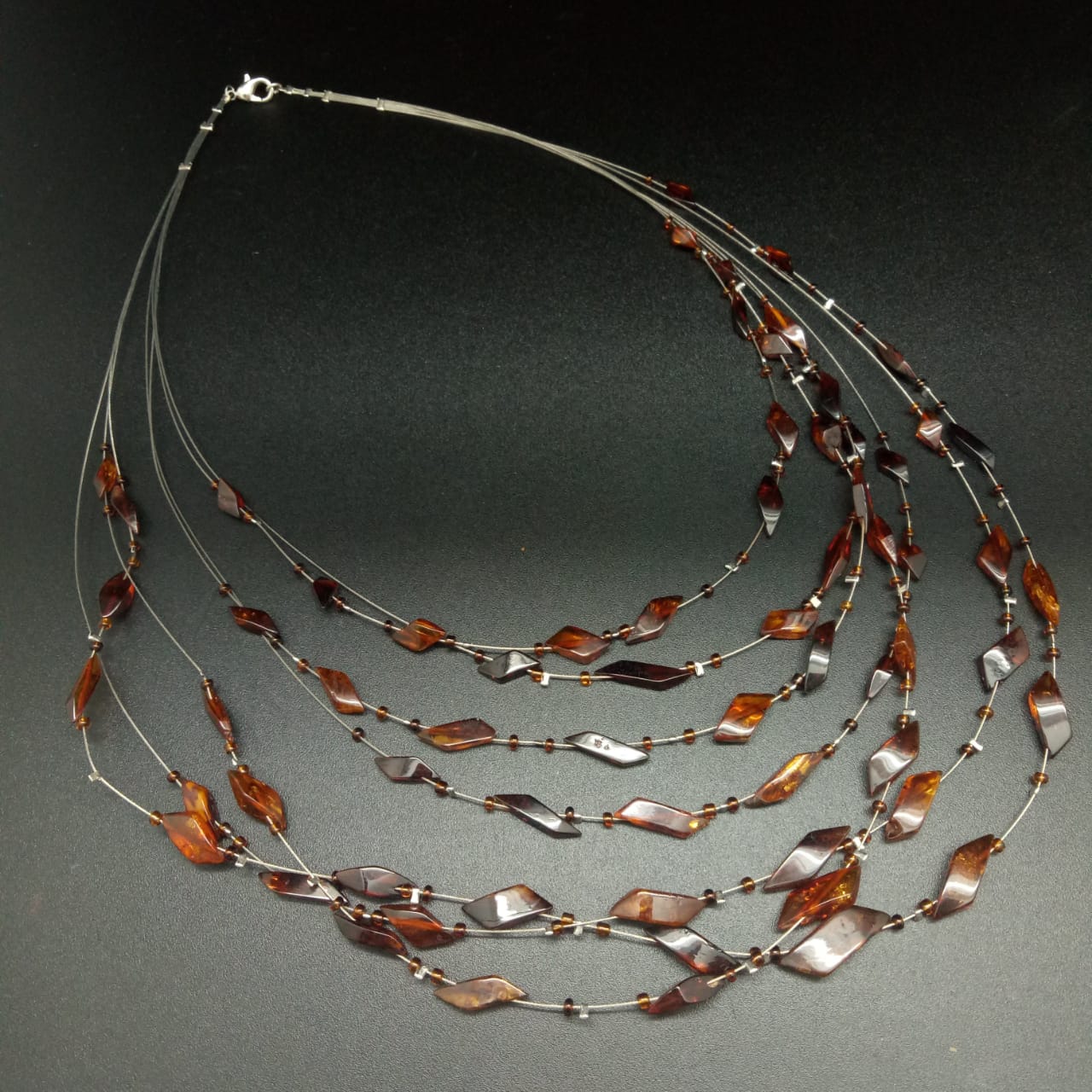 картинка Ожерелье из семи струн с янтарем 60 см 02 nl270 от магазина El Corazon