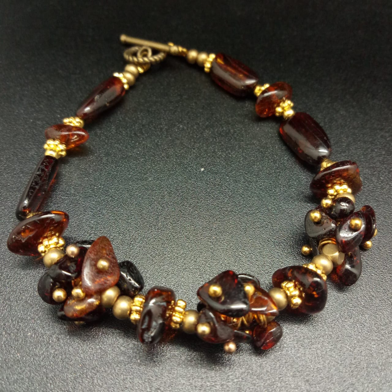 картинка Браслет d 7 см, из янтаря и ювелирного металла 04 bracelet-160 от магазина El Corazon