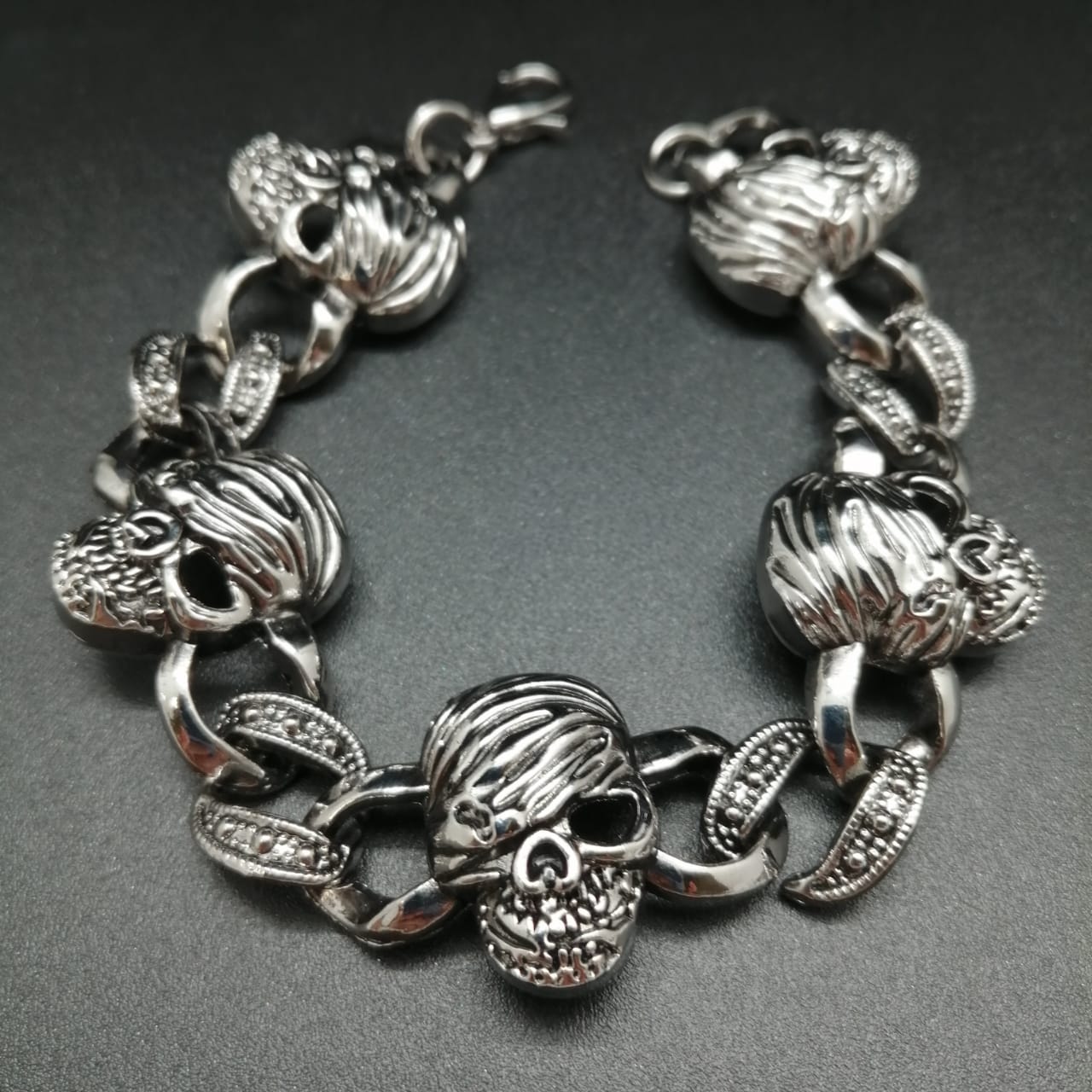 картинка Мужской браслет из ювелирного металла с черепами 20,5 см 02 от магазина El Corazon