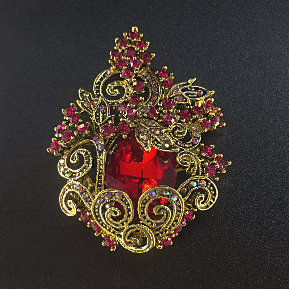 картинка Брошь золотая 5 см с красным кристаллом от магазина El Corazon