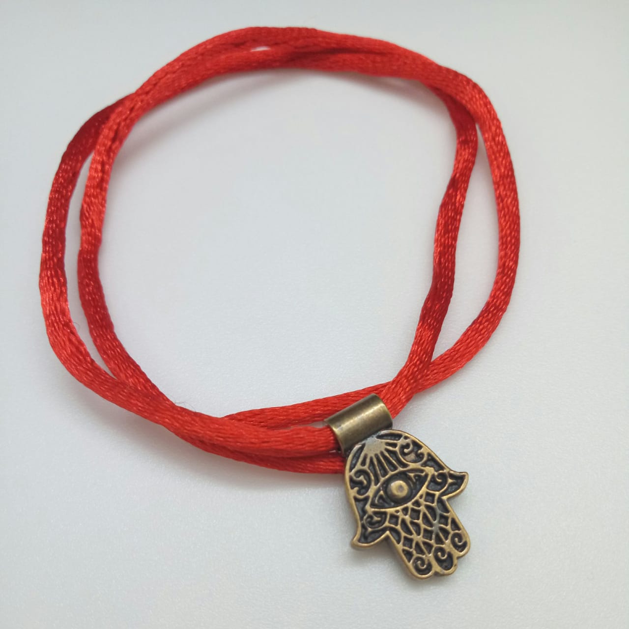 картинка Красная нить браслет с подвеской Хамса от магазина El Corazon