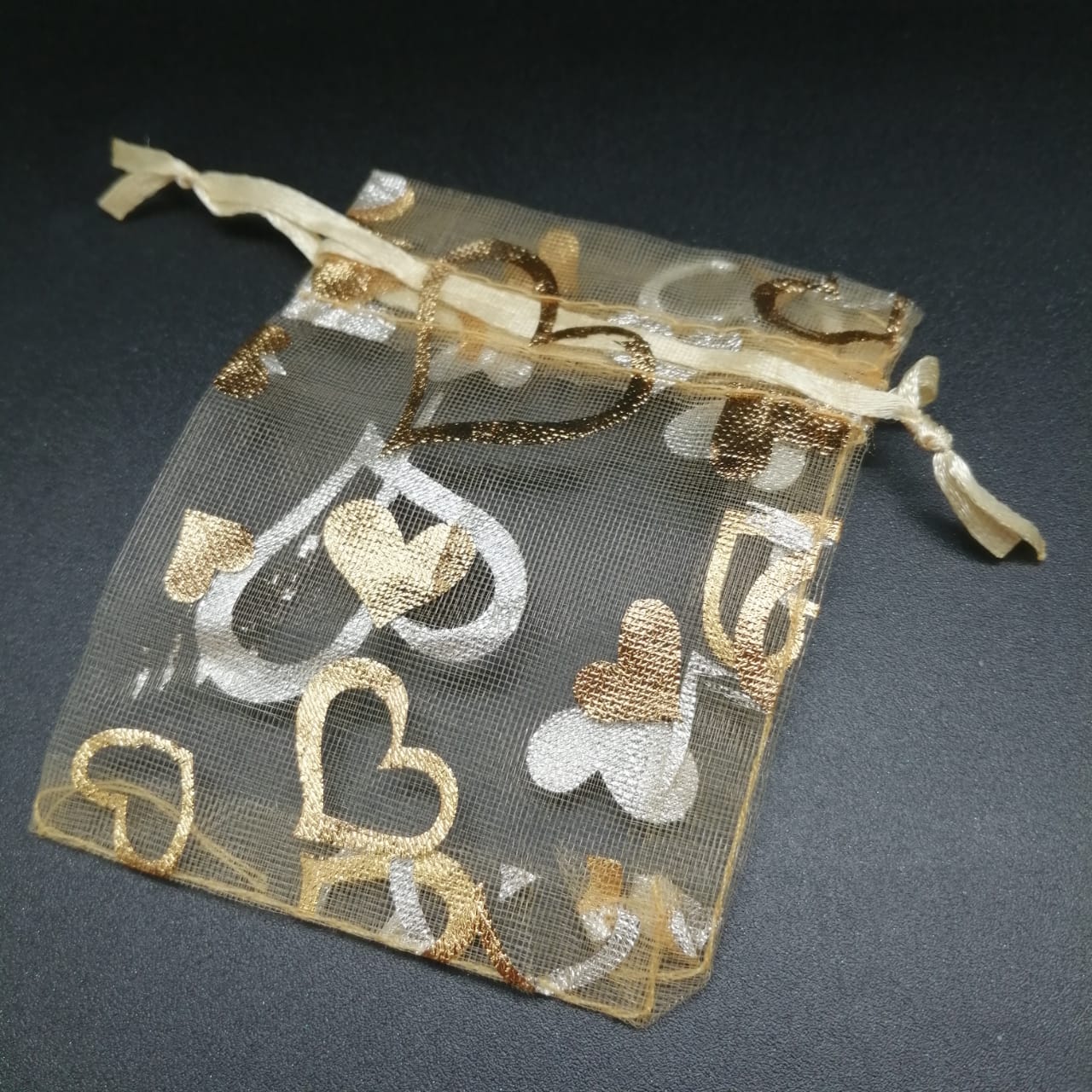 картинка Подарочный мешочек с завязками для украшений 8,5 х 6,5 см, золото с сердечками от магазина El Corazon
